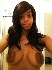Nasty ebony babysitter takes pictures of her big nipples